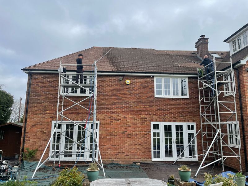 Roof cleaning carried out safely from scaffold towers by The Roof Moss Cleaners in Princes Risborough